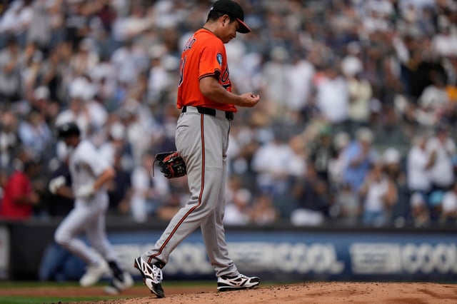 Baltimore Orioles pitcher Tomoyuki Sugano, right, reacts as New York Yankees’ Ryan McMahon runs the bases after hitting a home run during the second inning of a baseball game Saturday, Sept. 27, 2025, in New York. (AP Photo/Frank Franklin II)