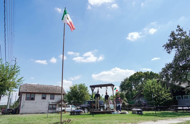 The display built by Second Ward resident Mark Rodriguez, pictured on Saturday, has elicited criticism online.