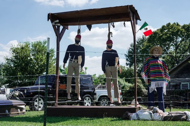 The display built by Second Ward resident Mark Rodriguez, pictured on Saturday, has elicited criticism online.