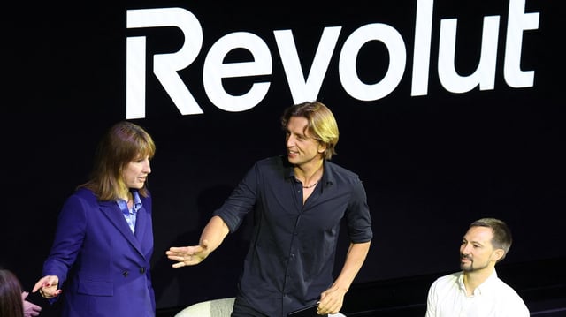 Rachel Reeves with Nikolay Storonsky, chief executive of Revolut bank, and Vlad Yatsenko, chief technology officer