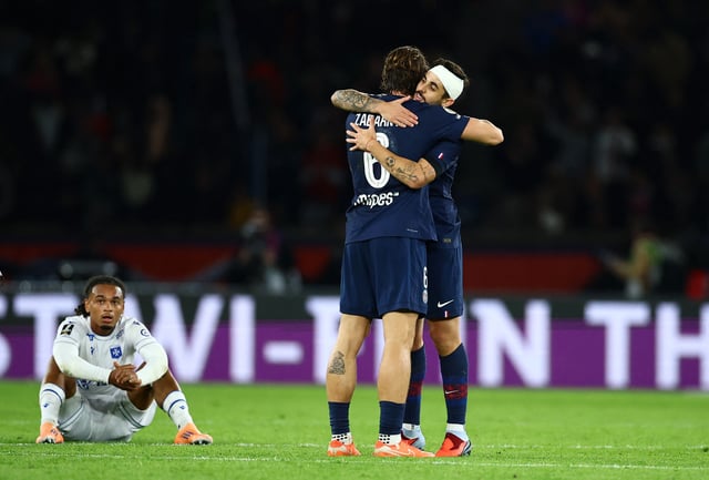 Soccer Football - Ligue 1 - Paris St Germain v AJ Auxerre - Parc des Princes, Paris, France - September 27, 2025 Paris St Germain's Lucas Beraldo and Illia Zabarnyi celebrate after the match REUTERS/Sarah Meyssonnier