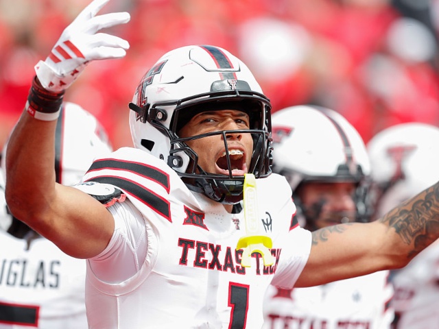 SALT LAKE CITY, UT - SEPTEMBER 20: Reggie Virgil #1 of the Texas Tech Red Raiders celebrates scoring a touchdown against the Utah Utes during the second half of their game at Rice-Eccles Stadium on September 20, 2025 in Salt Lake City, Utah. (Photo by Chris Gardner/ Getty Images)