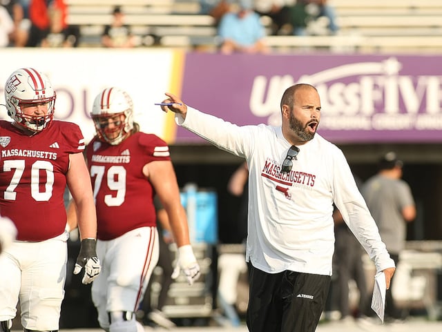 UMass Football vs Bryant 9/6/25.  UMass Head Coach Joe Harasymiak, gives instructions to his players during warmups at Warren P. McGuirk Alumni Stadium.
photo by J. Anthony Roberts
