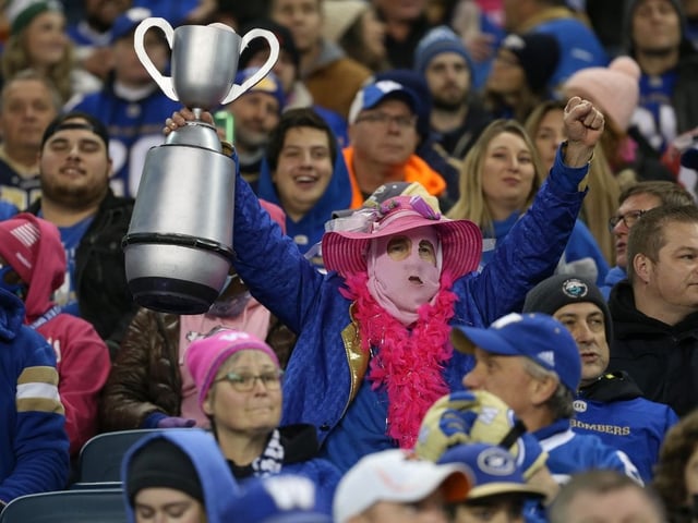 "In brighter times: Fans in blue and gold cheer during the 2021 Banjo Bowl in Winnipeg — a reminder of the passion and pride many now feel is under threat as the CFL moves toward major rule changes."