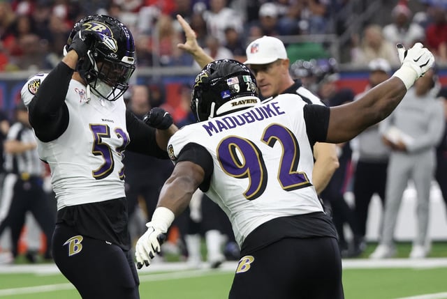 Dec 25, 2024; Houston, Texas, USA; Baltimore Ravens defensive tackle Nnamdi Madubuike (92) celebrates  linebacker Kyle Van Noy (53) sack against Houston Texans quarterback C.J. Stroud (7) (not pictured) in the first quarter at NRG Stadium. Mandatory Credit: Thomas Shea-Imagn Images/File Photo