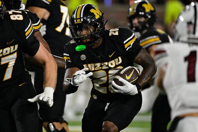 Jamal Roberts #20 of the Missouri Tigers runs against the South Carolina Gamecocks at Faurot Field at Memorial Stadium on September 20, 2025 in Columbia, Missouri.