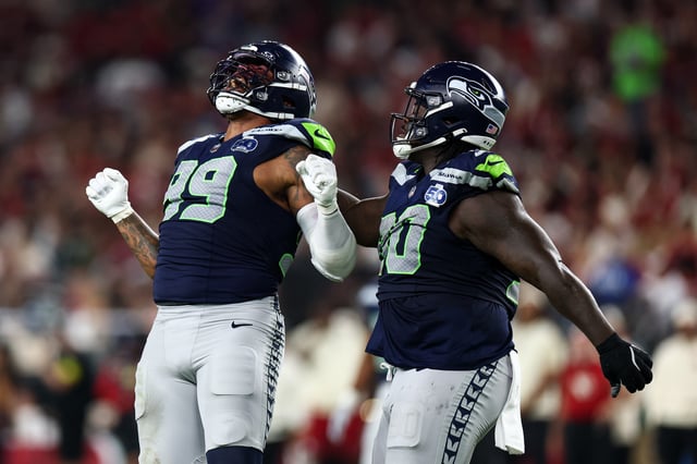 Leonard Williams #99 of the Seattle Seahawks celebrates after a sack during an NFL football game against the Arizona Cardinals at State Farm Stadium on September 25, 2025 in Glendale, Arizona. (Photo by Kevin Sabitus/Getty Images)