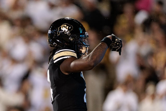 Omarion Miller #4 of the Colorado Buffaloes reacts after scoring a touchdown during the second quarter against the Wyoming Cowboys at Folsom Field on September 20, 2025 in Boulder, Colorado.