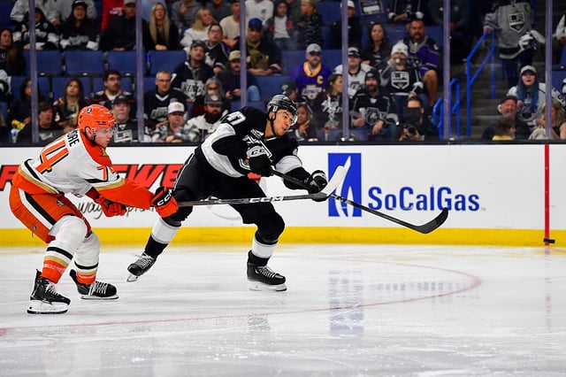 ONTARIO, CA - SEPTEMBER 21: Ian Moore #74 of the Anaheim Ducks and Andre Lee #47 of the Los Angeles Kings battle for position during the third period in a pre-season game at the Toyota Arena on September 21, 2025 in Ontario, California. (Photo by Gary A. Vasquez/NHLI via Getty Images)