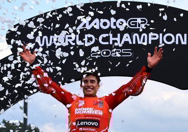 MotoGP - Japanese Grand Prix - Mobility Resort Motegi, Motegi, Japan - September 28, 2025 Ducati Lenovo Team's Marc Marquez celebrates on the podium after winning the 2025 MotoGP World Championship REUTERS/Kim Kyung-Hoon