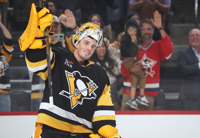 Sep 27, 2025; Pittsburgh, Pennsylvania, USA;  Pittsburgh Penguins goaltender Marc-Andre Fleury (29) acknowledges the crowd after playing in his final NHL game against the Columbus Blue Jackets at PPG Paints Arena. Mandatory Credit: Charles LeClaire-Imagn Images/File Photo