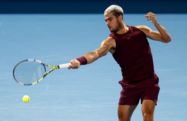Tennis - ATP 500 - Japan Open Tennis Championships - Ariake Coliseum, Tokyo, Japan - September 28, 2025 Spain's Carlos Alcaraz in action during his quarter final match against Brandon Nakashima of the U.S. REUTERS/Manami Yamada
