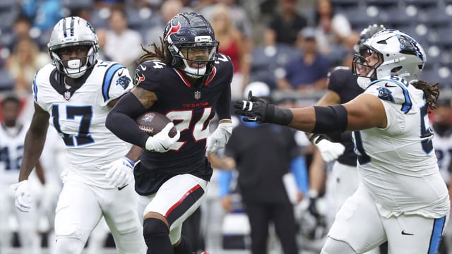Aug 16, 2025; Houston, Texas, USA; Houston Texans cornerback Derek Stingley Jr. (24) runs with the ball during the first quarter against the Carolina Panthers at NRG Stadium. Mandatory Credit: Troy Taormina-Imagn Images
