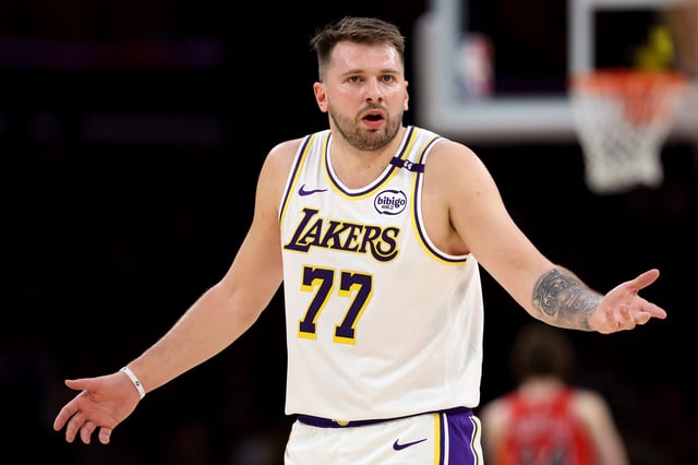 Luka Doncic #77 of the Los Angeles Lakers reacts against the Chicago Bulls during the first quarter at Crypto.com Arena on March 22, 2025 in Los Angeles, California.