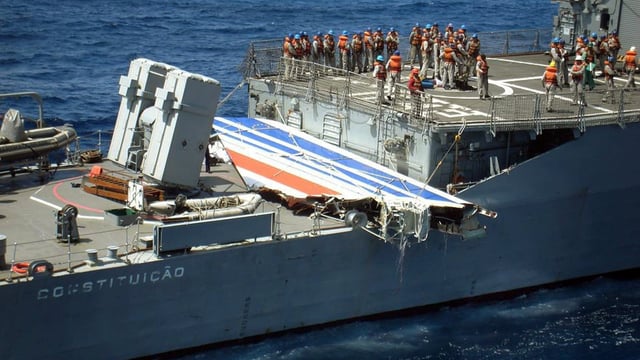 The Brazilian Navy carrying part of the tailfin of the Air France Airbus A330 aircraft that crashed in June 2009