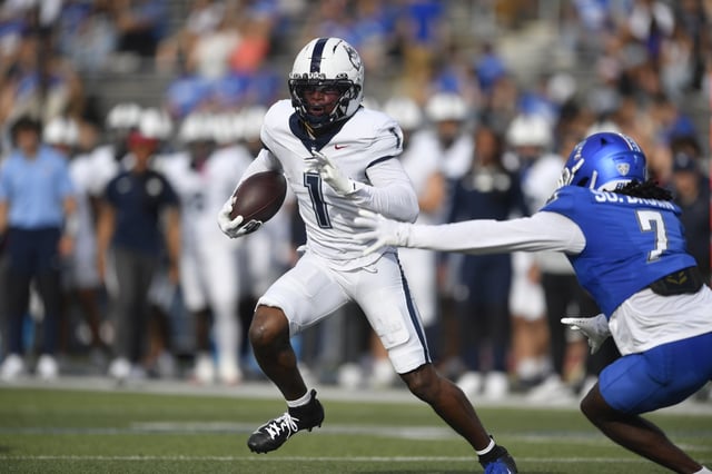 UConn wide receiver Skyler Bell heads upfield during the first half of the Huskies' game at Buffalo on Saturday, Sept. 27, 2025. (Courtesy of UConn)