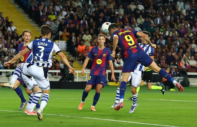 Soccer Football - LaLiga - FC Barcelona v Real Sociedad - Estadi Olimpic Lluis Companys, Barcelona, Spain - September 28, 2025 FC Barcelona's Robert Lewandowski scores their second goal REUTERS/Albert Gea