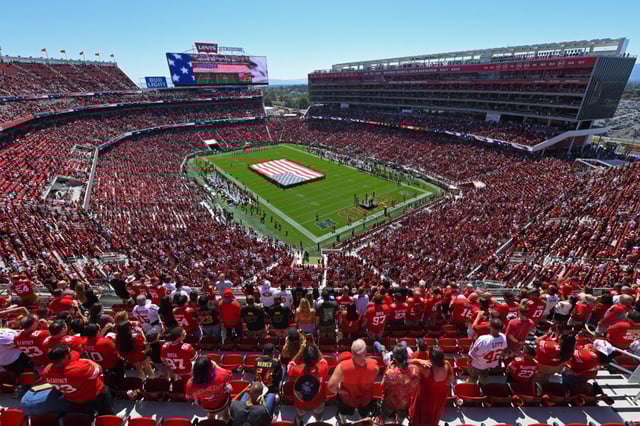 Football fans stand during the playing of the national anthem before their NFL game at Levi’s Stadium in Santa Clara, Calif., on Sunday, Sept. 21, 2025. (Jose Carlos Fajardo/Bay Area News Group)