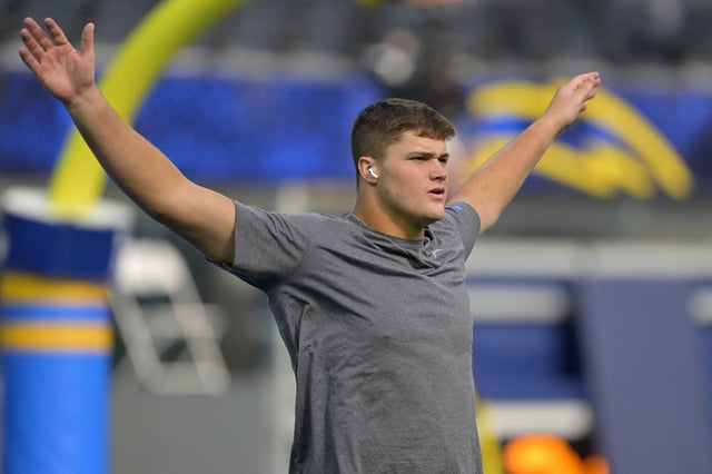 Dec 15, 2024; Inglewood, California, USA;  Los Angeles Chargers offensive tackle Joe Alt (76) warms up prior to the game against the Tampa Bay Buccaneers at SoFi Stadium. Mandatory Credit: Jayne Kamin-Oncea-Imagn Images/File Photo
