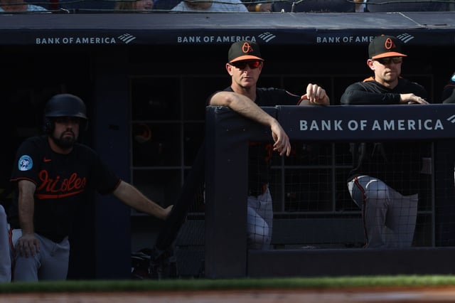 Baltimore Orioles interim manager Tony Mansolino, center, watches from the dugout during the first inning of a baseball game against the New York Yankees, Sunday, Sept. 28, 2025, in New York. (AP Photo/Pamela Smith)