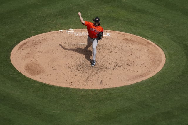 Houston Astros starting pitcher Lance McCuller Jr. (43) delivers during an MLB baseball game in Anaheim, Sunday, Sept. 28, 2025.