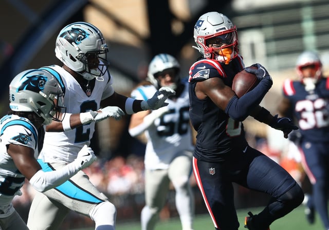 Foxboro, MA - New England Patriots wide receiver Stefon Diggs runs up field after a catch during the second quarter of the game at Gillette Stadium. (Nancy Lane/Boston Herald)