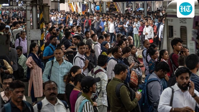 Commuters crowd Dadar station during peak hour