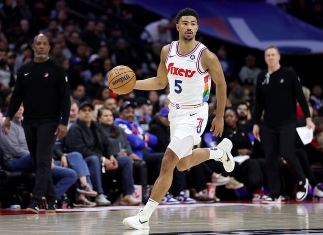 PHILADELPHIA, PENNSYLVANIA - MARCH 03: Quentin Grimes #5 of the Philadelphia 76ers dribbles the ball during the second half against the Portland Trail Blazers at the Wells Fargo Center on March 03, 2025 in Philadelphia, Pennsylvania. (Photo by Emilee Chinn/Getty Images)