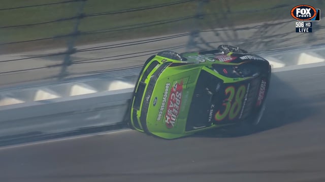Zane Smith in the #38 Front Row Motorsports Ford Mustang rolled onto its side after contact from John Hunter Nemechek.