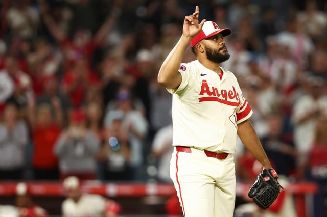 Angels pitcher Kenley Jansen gestures after a strikeout during the ninth inning of a baseball game against the Kansas City Royals, Wednesday, Sept. 24, 2025, in Anaheim, Calif. (AP Photo/Jessie Alcheh)