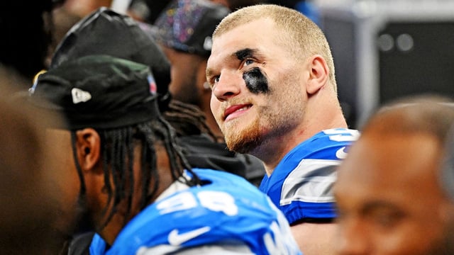 Sep 28, 2025; Detroit, Michigan, USA; Detroit Lions defensive end Aidan Hutchinson (97) looks on from the bench during the second half against the Cleveland Browns at Ford Field. Mandatory Credit: Lon Horwedel-Imagn Images