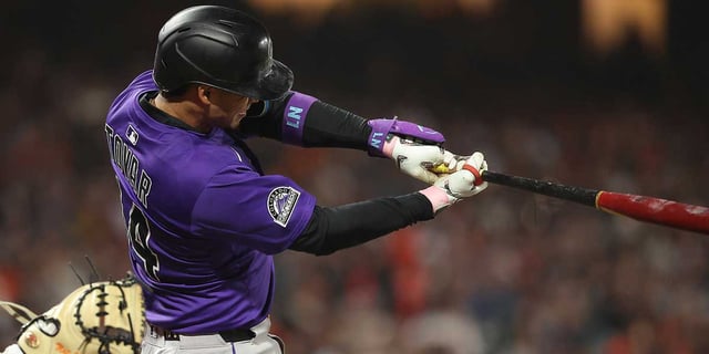 Sep 26, 2025; San Francisco, California, USA; Colorado Rockies shortstop Ezequiel Tovar (14) hits a three-run home run against the San Francisco Giants during the fifth inning at Oracle Park. Mandatory Credit: Kelley L Cox-Imagn Images