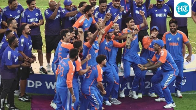 Indian team celebrates on the podium without the trophy after winning the Asia Cup in Dubai on Sunday. 