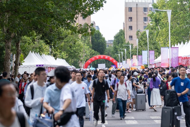 New undergraduate students arrive at the campus of Beijing's Tsinghua University last August.