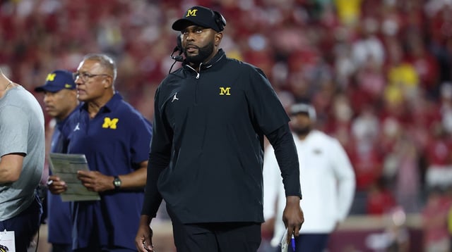 Sep 6, 2025; Norman, Oklahoma, USA; Michigan Wolverines head coach Sherrone Moore on the sidelines during the second half of a game against the Oklahoma Sooners at Gaylord Family-Oklahoma Memorial Stadium. Mandatory Credit: Kevin Jairaj-Imagn Images