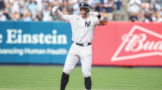 Sep 27, 2025; Bronx, New York, USA; New York Yankees right fielder Aaron Judge (99) gestures after hitting a two run single in the fifth inning against the Baltimore Orioles at Yankee Stadium. Mandatory Credit: Wendell Cruz-Imagn Images