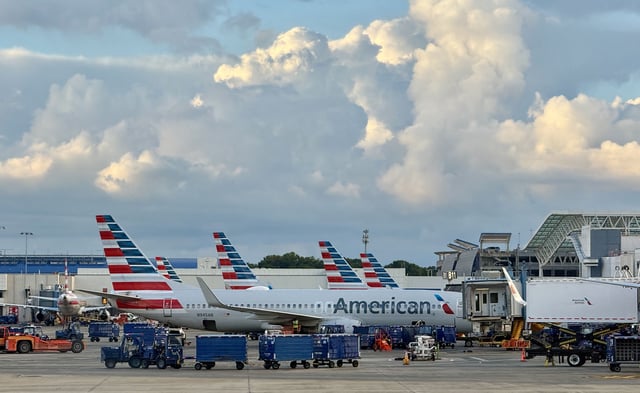 American Airlines planes sit at gate at Charlotte Douglas International Airport in Charlotte, North Carolina, on Saturday.