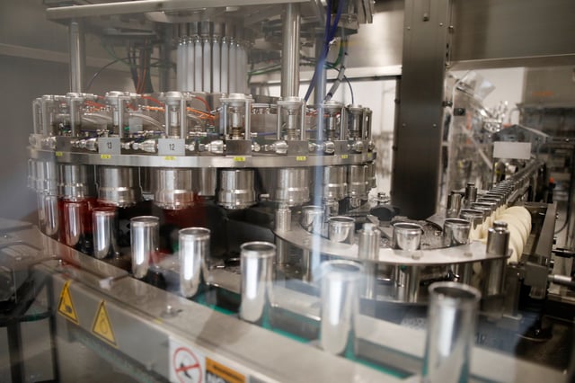 Beverage cans are run through machinery during a tour at a Canopy Growth facility that produces cannabis derivatives in Smiths Falls, Ontario, Canada October 29, 2019.  REUTERS/Blair Gable