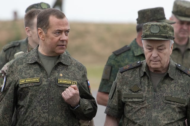 Russia's former leader Dmitry Medvedev, an ally of Russian President Vladimir Putin and deputy chairman of the country's Security Council, visits the Prudboy range in the Volgograd region, southern Russia, on June 1, 2023.