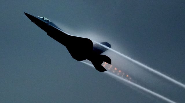 The J-35A fighter jet performs in the sky on day 4 of the 15th China International Aviation and Aerospace Exhibition