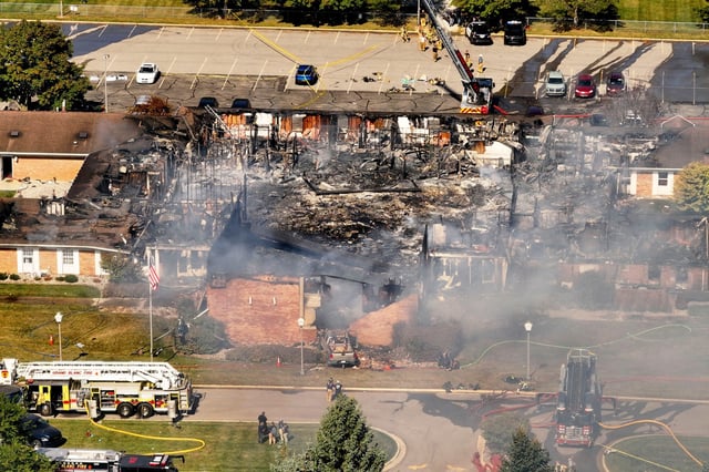Emergency crews respond to a shooting and fire at The Church of Jesus Christ of Latter-day Saints, in Grand Blanc, Mich., Sept. 28, 2025.