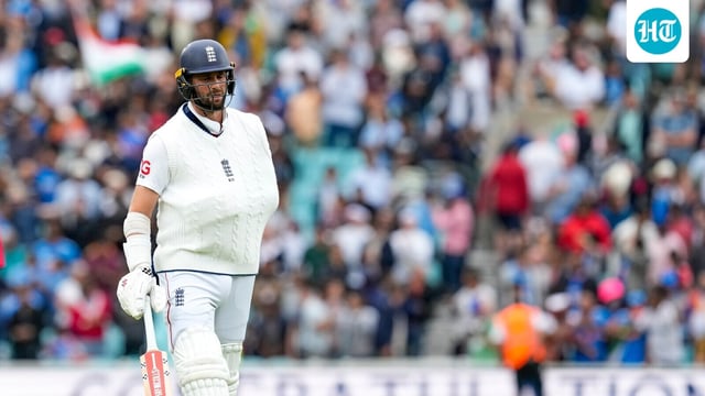 Chris Woakes walks back to the pavilion after the team lost the fifth Test match against India, at The Oval cricket ground, in London.