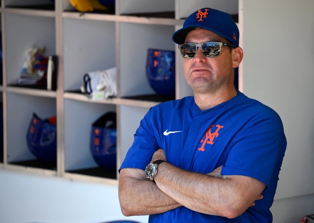 SAN DIEGO, CALIFORNIA - JULY 30: Carlos Mendoza #64 of the New York Mets looks on from the dugout before the game against the San Diego Padres at Petco Park on July 30, 2025 in San Diego, California. (Photo by Orlando Ramirez/Getty Images)
