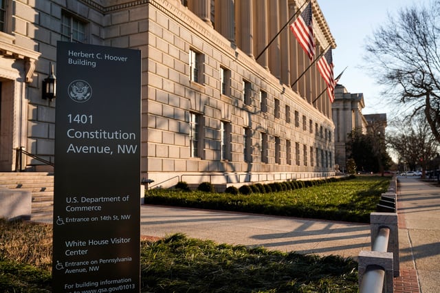The Department of Commerce building is seen before an expected report of new home sales numbers in Washington, U.S., January 26, 2022.      REUTERS/Joshua Roberts