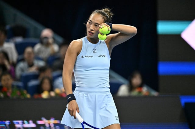 China’s Zheng Qinwen reacts during her women’s singles match against Czech Republic’s Linda Noskova at the China Open tennis tournament in Beijing on September 29, 2025.