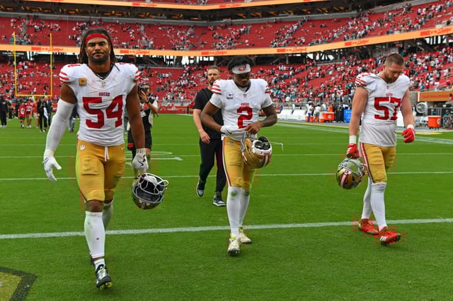 San Francisco 49er’s Fred Warner (54), Deommodore Lenoir (2) and Luke Gifford (57) walk off the field after being defeated by the Jacksonville Jaguars during their NFL game at Levi’s Stadium in Santa Clara, Calif., on Sunday, Sept. 28, 2025. The Jacksonville Jaguars defeated the San Francisco 49ers 26-21. (Jose Carlos Fajardo/Bay Area News Group)