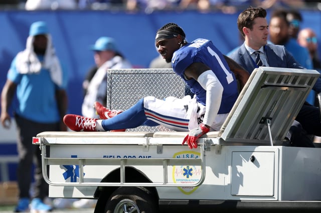 EAST RUTHERFORD, NEW JERSEY - SEPTEMBER 28: Malik Nabers #1 of the New York Giants reacts after being injured against the Los Angeles Chargers during the second quarter in the game at MetLife Stadium on September 28, 2025 in East Rutherford, New Jersey. (Photo by Al Bello/Getty Images)