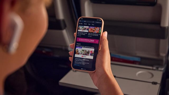 delta passenger watching youtube