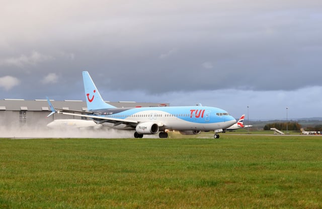 RHOOSE WALES - NOVEMBER 15:  A general view of a Boeing B738  operated by TUI holidays flight departs Cardiff Wales Airport for Tenerife on November 15, 2022 in Rhoose, Wales. Cardiff Wales Airport has been under the ownership of the Welsh Government since March 2013, operating as a commercial business. Passenger numbers were 1.66 million in 2019 and were increasing year-on-year. (Photo by Huw Fairclough/Getty Images)