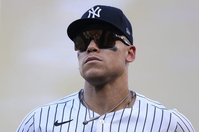 New York Yankees' Aaron Judge runs to the dugout during the sixth inning of a baseball game against the Baltimore Orioles, Sunday, Sept. 28, 2025, in New York. (AP Photo/Pamela Smith)